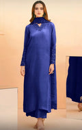 Royal blue palazzo suit by Armas featuring intricate lace and sequin detailing on the neckline and cuffs.